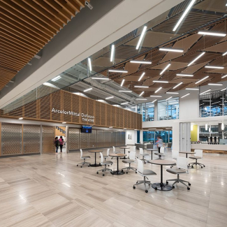 The interior material palette is balanced between robust steel and concrete and warmer materials such as wood and stone tile, to create a rich and inviting learning environment. All materials were locally sourced.
